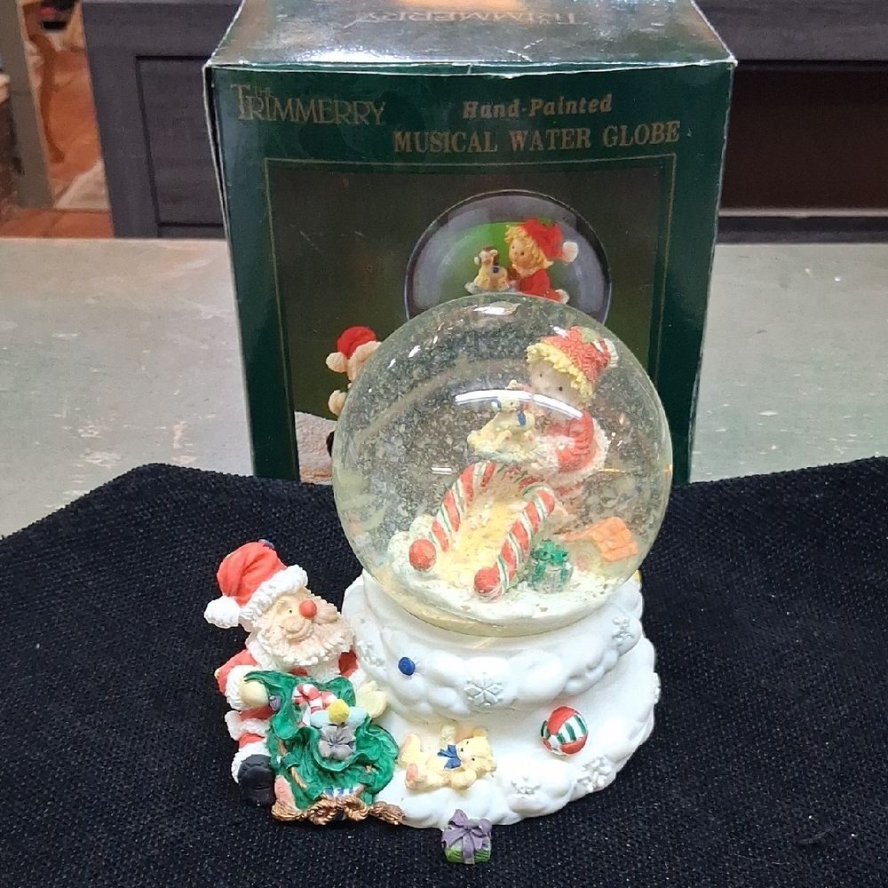 Santa And Elf Making Toys For Christmas‎